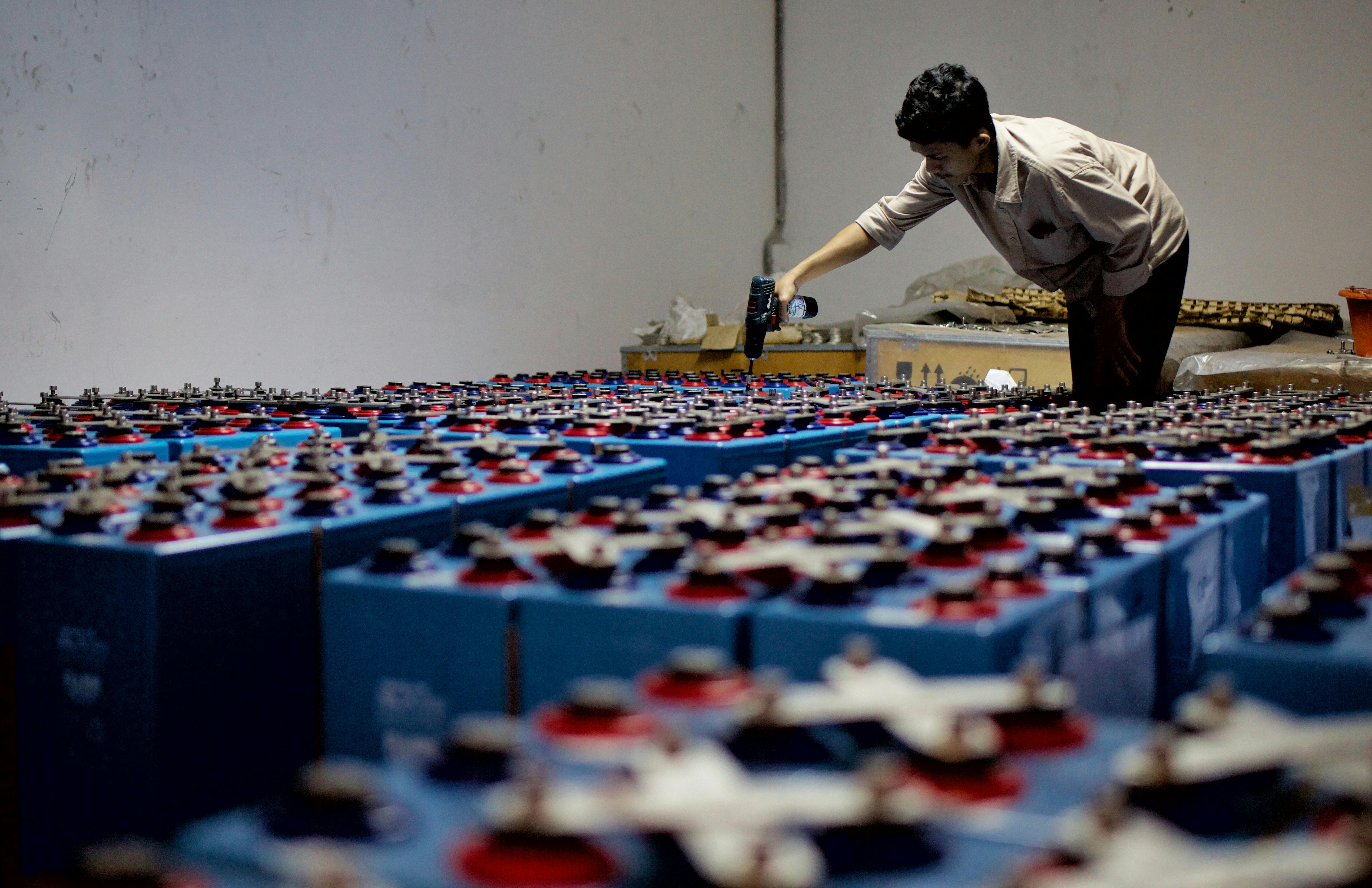 Industrial battery energy storage units in a warehouse facility